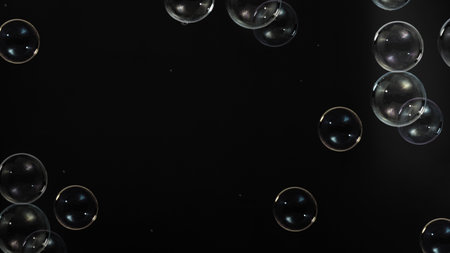 Soap bubble drop or Shampoo bubbles floating like flying in the air black background which represent...