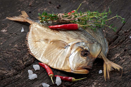 Vomer smoked fish on the wooden background