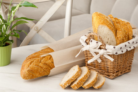 bread in a wicker basket on a light background on a table