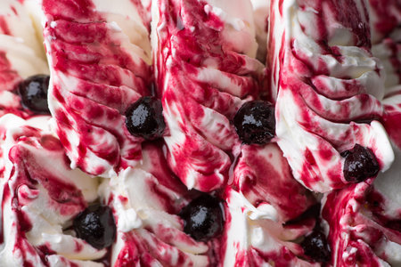 close-up of appetizing ice cream with berries, macro photographyの写真素材