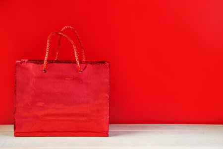 Black friday sale concept. Red shopping bag. Banner for advertising.の写真素材