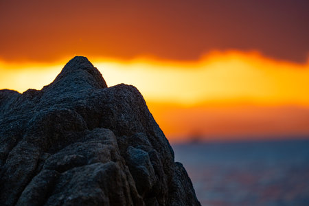 Close up the Foreground rock front of the Thailand sea in twilight time.の写真素材