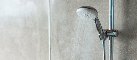 shower head with wall background in modern bathroomの写真素材