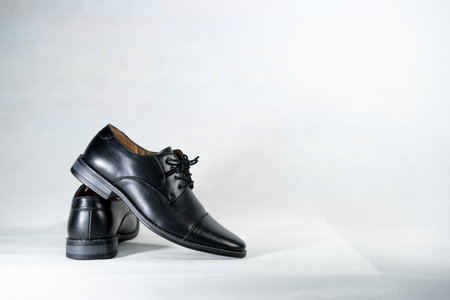 Luxuary man leather black shoe on the white isolation backtground.の写真素材