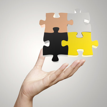 Hand showing 3d puzzle as conceptの写真素材