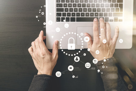 cyber security internet and networking concept.Businessman hand working with VR screen padlock icon...