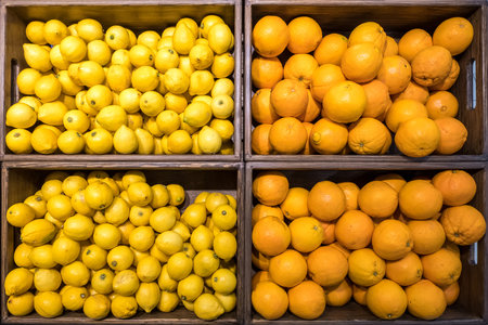 baskets with oranges and lemons in the mallの写真素材