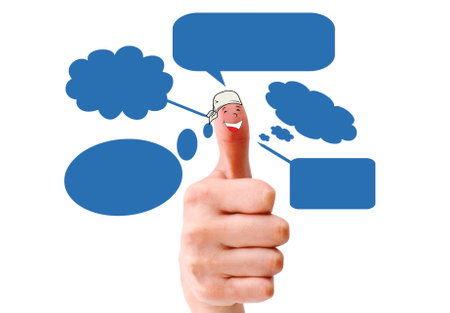 Happy  finger smileys holding   with social network signの写真素材