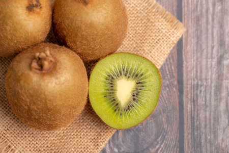 A half of kiwi on the table.