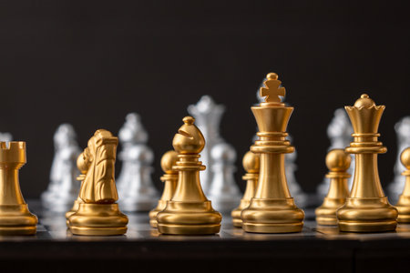 Gold and silver chess group on the boardの写真素材