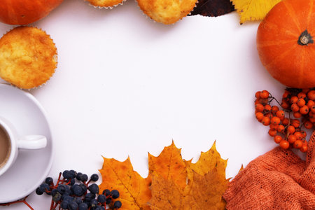 Cozy autumn flat lay with coffee, pumkin, sweater and copy space