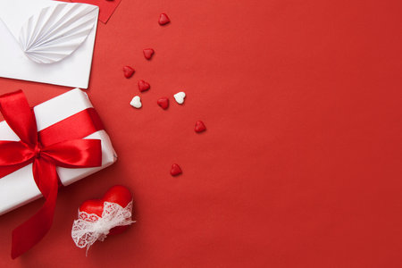 The apartment was on Valentine's Day. Gift, envelope, heart and hearts. Red and white combination with free space for textの写真素材