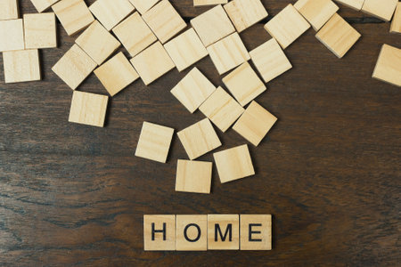 The home word on wood plate abstract background.