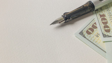 A pen and banknotes image for business concept.