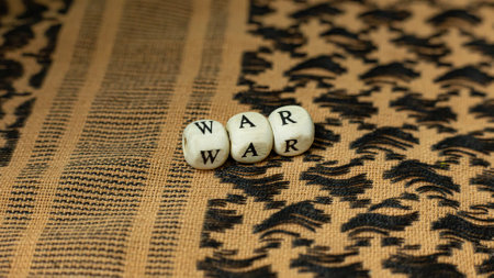 The war on wood cube  on  shemagh  for  military content.の写真素材