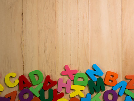 The  wood alphabet multi color on table for education or kid conceptの写真素材