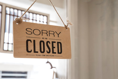 Close up of the sign board Closed shop or cafe of the window at the door