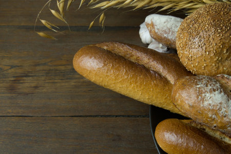 The  Bread  Wheat oats on wood  image background.