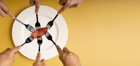 Food Shortage, World Food Crisis Concepts. Inflation, Fuel Price and Environmental Impact. Global Issues in Agricultural Production and Climate Change. Group of Hungry People Snatched a Tiny Steak by Forkの写真素材