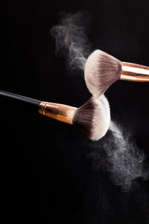 sprayed with a professional cosmetic brush powder powder, decorative cosmetics in the form of powder...