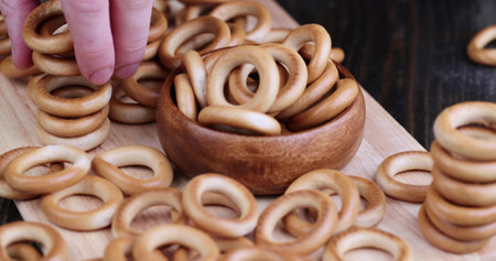 put on the traditional crispy and dry bread product, traditional Slavic food bagels made of wheat flourの写真素材