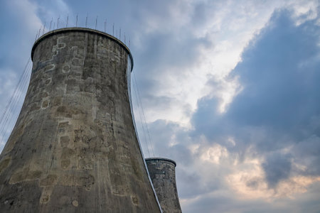 incredibly huge, industrial chimney made of concrete blocks. Concept of preserving the environment and taking care of natureの写真素材