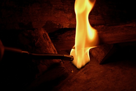 Starting a fire on a fireplace