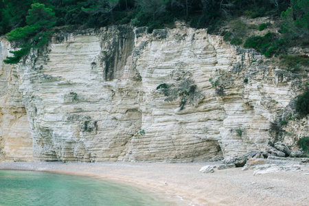 Amazing quite beach with turquoise water. Beach with small stones and beautiful cliffs around. Adorable meditation place. Love valley.の写真素材