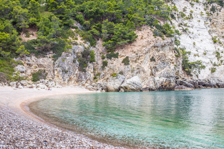 Amazing quite beach with turquoise water. Beach with small stones and beautiful cliffs around. Adorable meditation place. Love valley.の写真素材