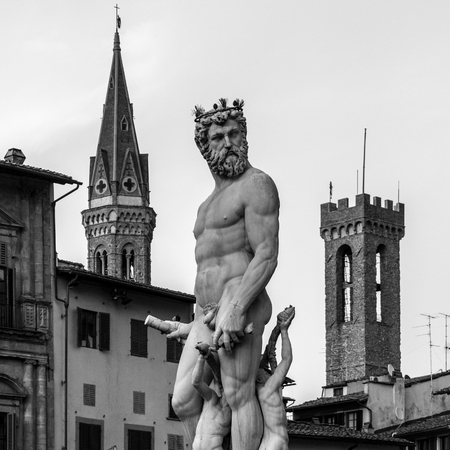 Statue of Neptune with towers and palace in background, Piazza della Signoria, Florence - Italyのeditorial素材