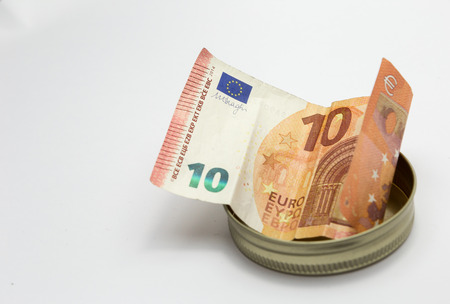 offering ten euros as tipsの写真素材