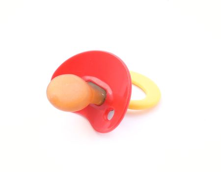 plastic soother isolated on whiteの写真素材
