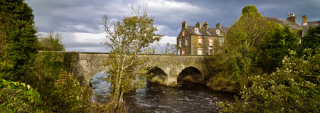 Old Bushmills village, bridge and river, Northern Ireland, autumn