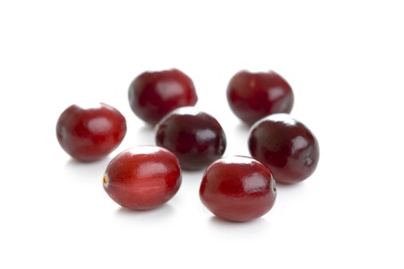 fresh whole cranberries isolated on a white backgroundの写真素材