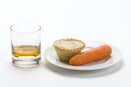 traditional food offering of mince pie, whisky and a carrot left at Christmas for Santa Clause and Rudolph the red nosed reindeerの写真素材