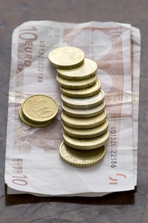 ten euro notes with euro coinsの写真素材