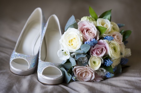 wedding shoes and bride's flowersの写真素材