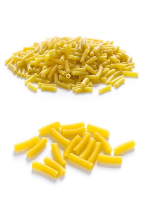 dried macaroni pasta isolated on a white backgroundの写真素材