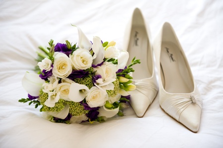 wedding shoes and flowers of the brideの写真素材