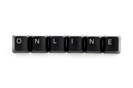 computer keys spelling the word online isolated on a white backgroundの写真素材
