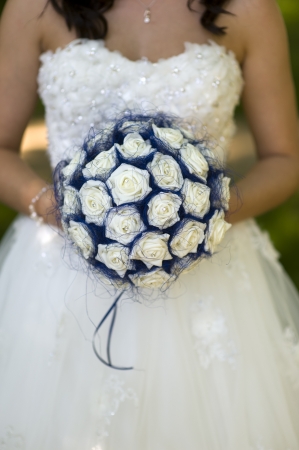 bride holding imitation flower bouquetの写真素材
