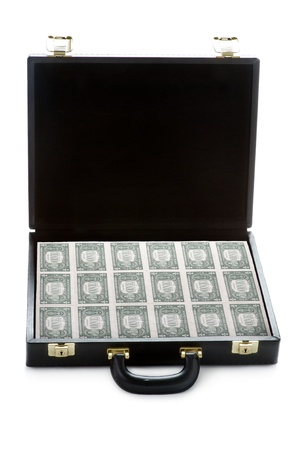open briefcase full of american dollars isolated on whiteの写真素材