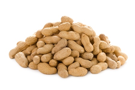 a heap of monkey nuts isolated on a white backgroundの写真素材