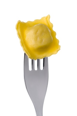 ravioli pasta parcel on a fork against whiteの写真素材