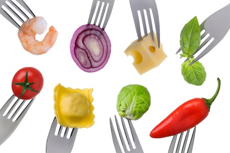 variety of healthy food on forks isolated on a white backgroundの写真素材