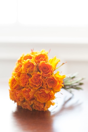 orange roses wedding bouquetの写真素材