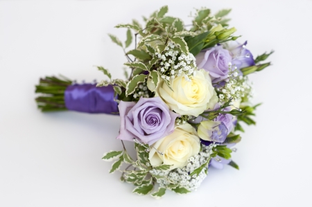 wedding bouquet of purple and white rosesの写真素材