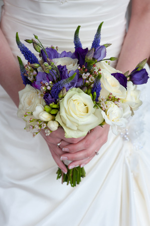 bride holding a wedding bouquetの写真素材