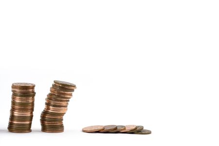 Toppling coins.の写真素材