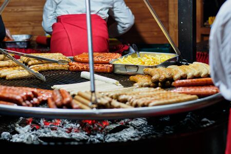 Street food at the main city fair Kebab, corn, grilled sausagesの写真素材